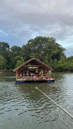 a group of people on a boat in the water at Krabi Floating Glamping in Ban Khlong Khae (2)
