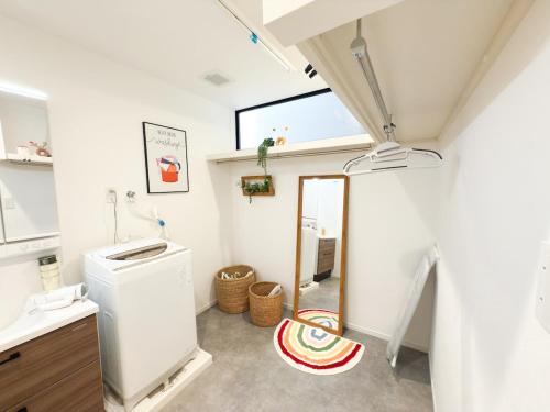 Wakyo Leeye-Newly built in 2026 Entire building-single unit with 3 bedrooms-can accommodate 7 people Free parking Direct access to USJ Namba Kyocera Dome