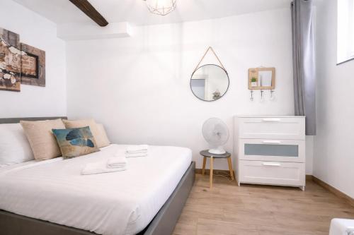 Llit o llits en una habitació de Le Mattoni