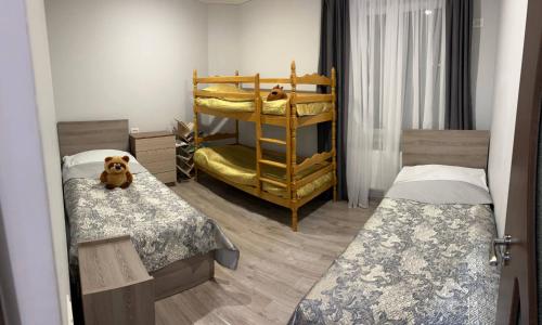 Llit o llits en una habitació de SD House