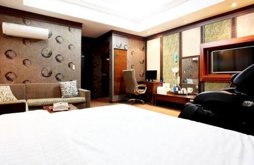 Postel nebo postele na pokoji v ubytování Luxury Hotel
