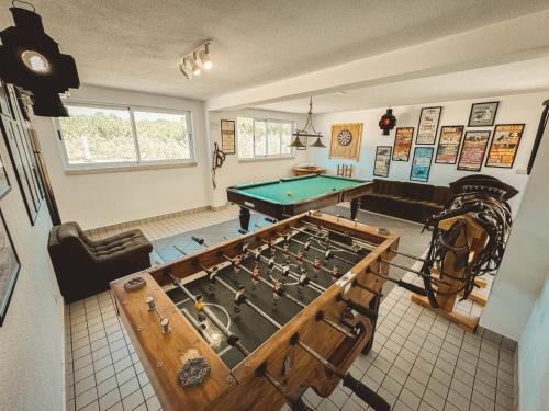 an overhead view of a room with a pool table at Quinta das Pinheirinhas in Tomar