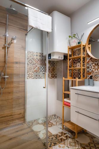 a bathroom with a shower and a sink at Chata Zuzana in Terchová