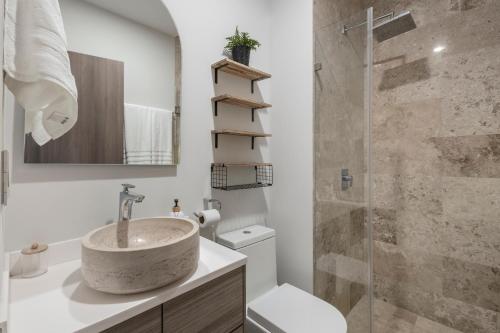 a bathroom with a sink and a shower at Private Pool with Beach Access and Baby Crib - Tulum Hotel Zone in Tulum