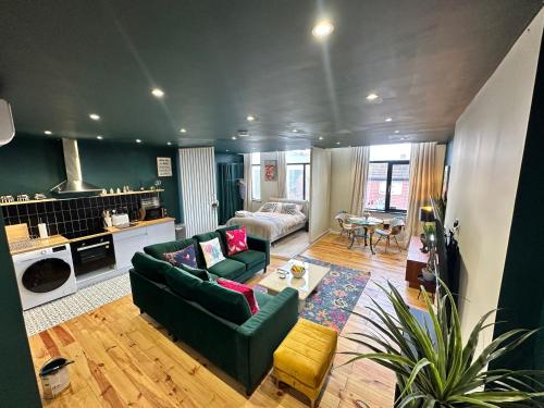 a living room with a couch and a table at STUNNING Apartments in Jarrow, next to A19 & Tyne Tunnel in East Howdon