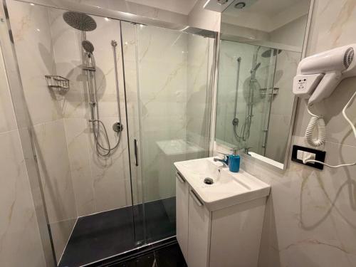 a bathroom with a shower and a sink and a shower at Venice Star Villa in Mestre