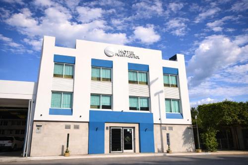 an office building with the hilton australia headquarters at Hotel Puesta del Sol in Campeche