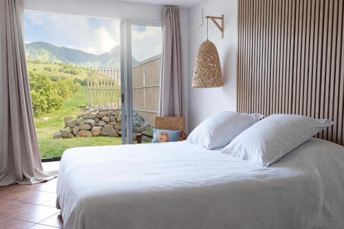 Llit o llits en una habitació de Villa Indigo