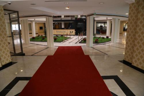 a red carpet in the middle of a lobby at Vivaldi Park Hotel in Ankara