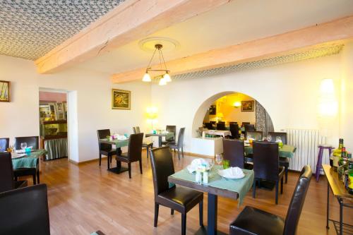Restoranas ar kita vieta pavalgyti apgyvendinimo įstaigoje Logis Auberge La Cremaillere