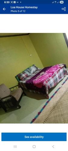 a picture of a bed in a room at sandbar Homestay in Lautoka