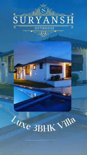a picture of a house with a swimming pool at Suryansh Outhouse in Jaipur
