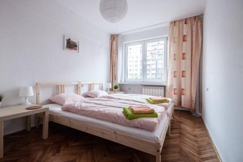 Posteľ alebo postele v izbe v ubytovaní Center Warsaw - Apartament Jana Pawła