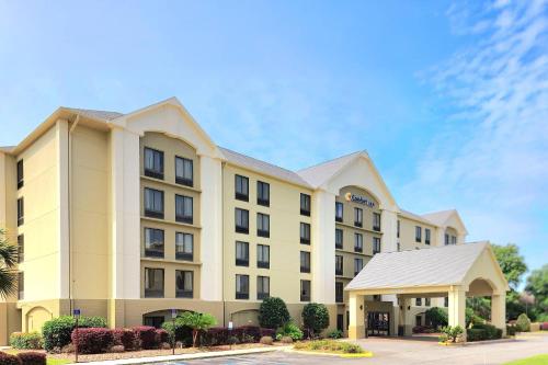 a rendering of the front of a hotel at Comfort Inn Pensacola - University Area in Pensacola