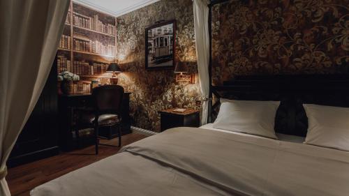 Posteľ alebo postele v izbe v ubytovaní Main Street Apartments