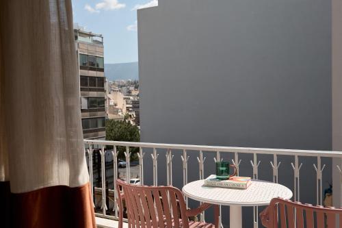 Mellow Apartment Steps away from Acropolis and the Metro Station in Koukaki by Lumen Living
