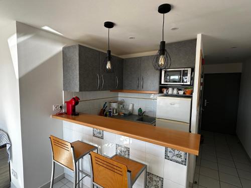 Appartement 2CH, clim, piscine, garage, mer
