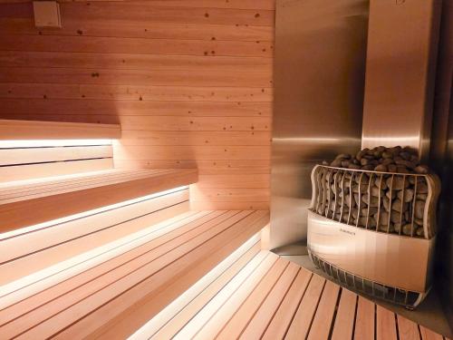 a sauna with a basket of mushrooms in it at LANDFORM workshop cottage KEIHOKU in Kyoto