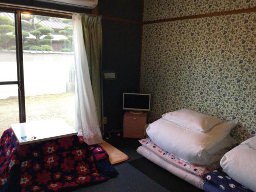Postel nebo postele na pokoji v ubytování Guesthouse SHELL
