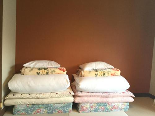 Ein Bett oder Betten in einem Zimmer der Unterkunft Guesthouse SHELL