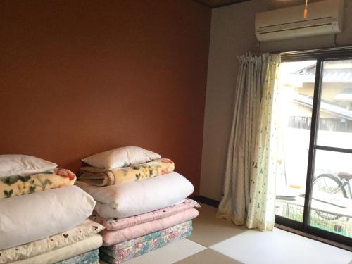 Ein Bett oder Betten in einem Zimmer der Unterkunft Guesthouse SHELL