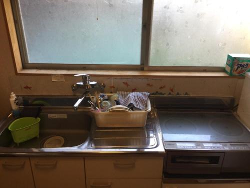 Vonios kambarys apgyvendinimo įstaigoje Oyajino Umi