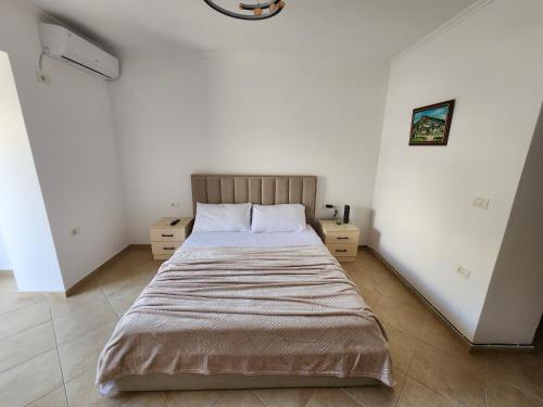 Llit o llits en una habitació de Manu Apartment