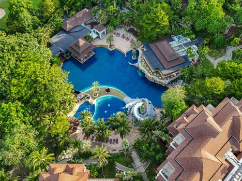 an overhead view of a pool at a resort at Springfield Village Golf & Spa in Cha Am