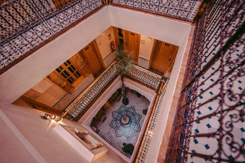 an overhead view of a staircase in a house at Riad Bleu Azahraa in Safi