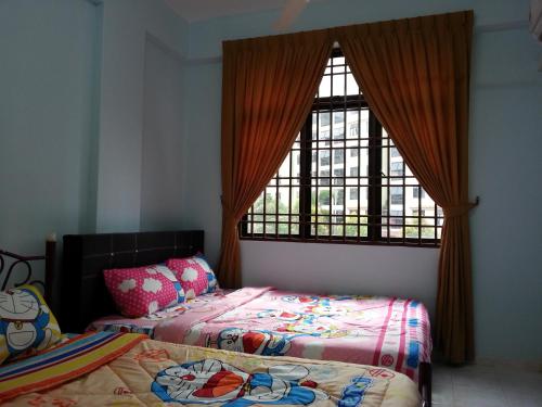 Homestay Bukit Beruang Melaka 객실 침대
