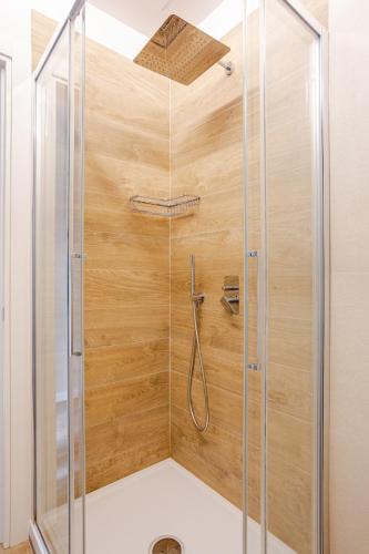 a shower with a glass enclosure in a bathroom at Signa, Firenze Casa Pilade in Signa