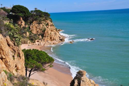 a view of the ocean from a cliff at Aparthotel Safari in Calella