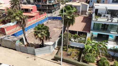 an aerial view of a city with palm trees and buildings at Beach Villa - By Bobbywashere in Santa Maria