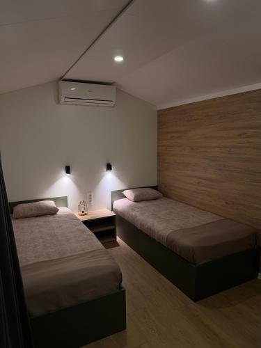 Llit o llits en una habitació de Kapija Svrljiga