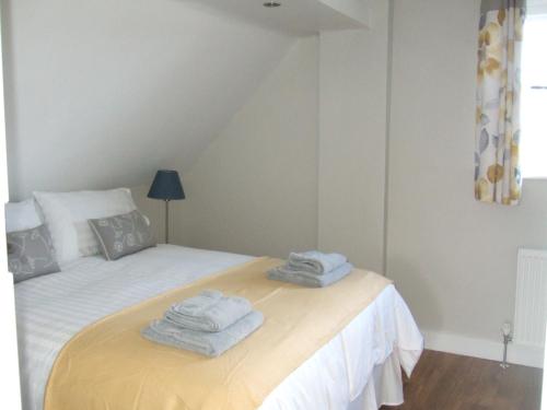 Ένα ή περισσότερα κρεβάτια σε δωμάτιο στο Maltings Loft