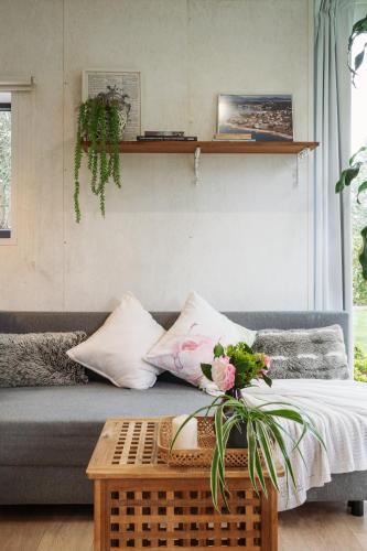 a living room with a couch and a table at Casa Salitre in Boiro