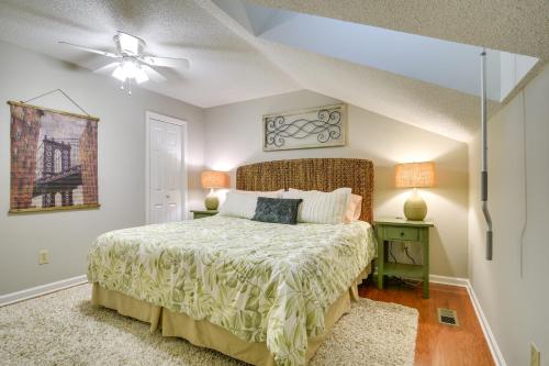 a bedroom with a bed and a ceiling fan at Pinehurst Condo ~ 2 Miles to Downtown & Resort! in Pinehurst