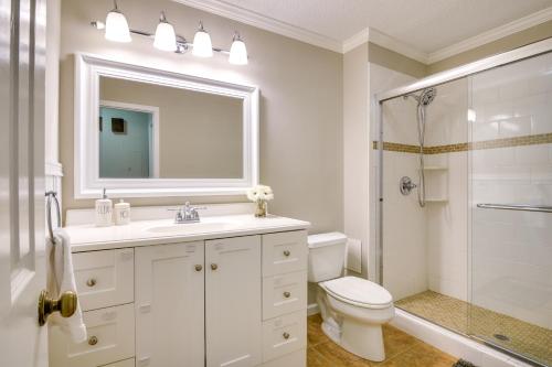 a bathroom with a sink and a toilet and a shower at Pinehurst Condo ~ 2 Miles to Downtown & Resort! in Pinehurst