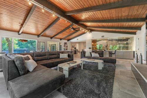 a living room with a couch and a table at Chic Modern Glam in Rockford