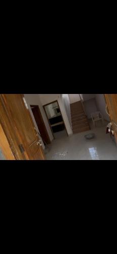 a view of a room with a door and a room with a room at Sn homes in Dehradun