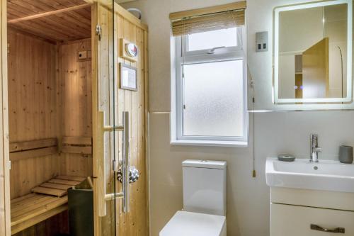 a bathroom with a toilet and a sink at Primrose 2 bed-No Pets-Daisy in Eye