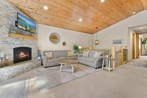 a living room with a couch and a fireplace at The Speckled Gem in Kings Beach