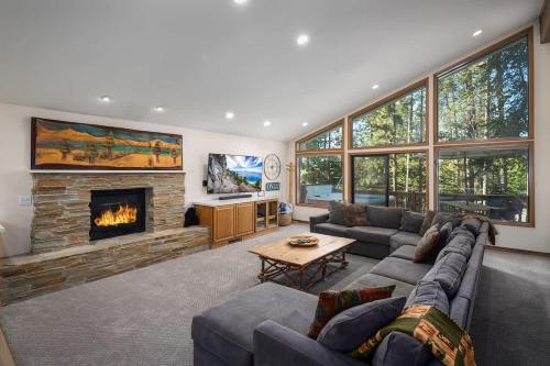 a living room with a couch and a fireplace at Sandy Shores Villa in Tahoe Vista