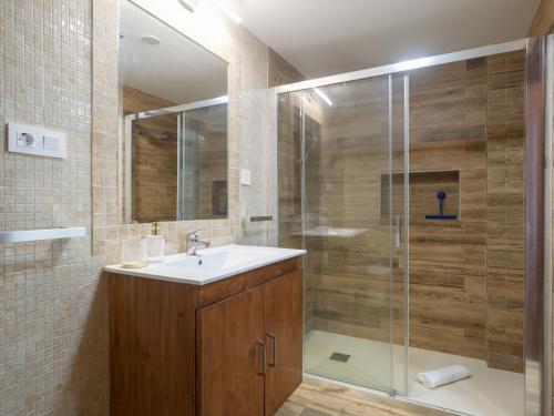 a bathroom with a sink and a shower at Aguadulce Agaete 1A in Agaete