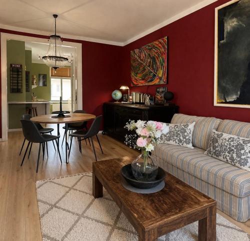 a living room with a couch and a table at Apartment Mare in Rostock