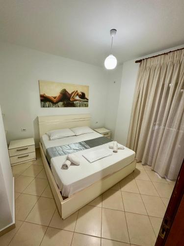 Llit o llits en una habitació de Bellas apartment