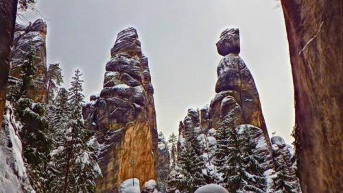 a group of large rocks with snow on them at Penzion Adršpach u Báry in Adršpach