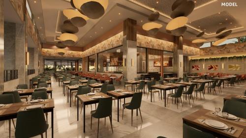an image of a restaurant with tables and chairs at Riu Palace Peninsula - All Inclusive in Cancún