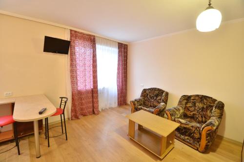 Телевизор и/или развлекательный центр в Cozy studio apartment on Sadovaya