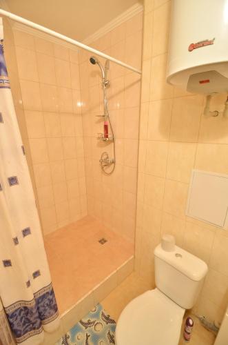 Ванная комната в Cozy studio apartment on Sadovaya